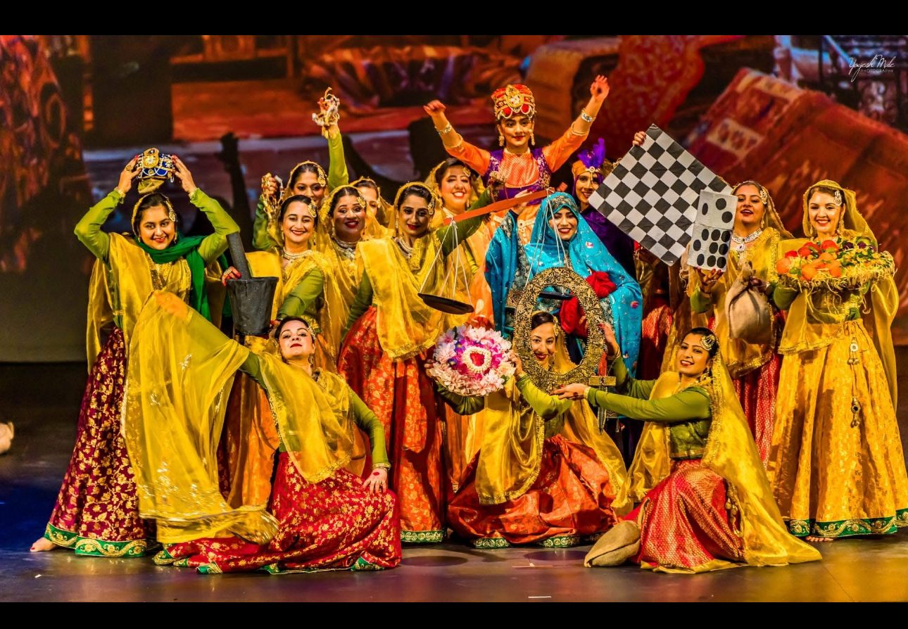 Neti on stage with the Vasantsena cast