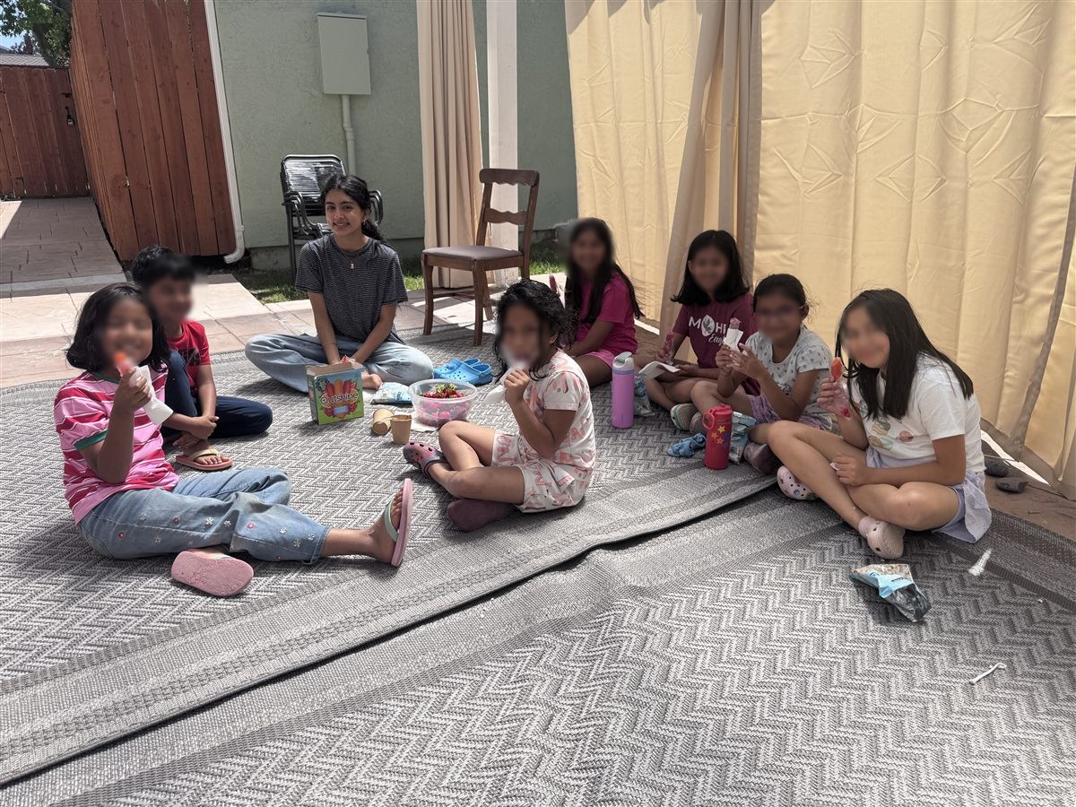 Campers on a snack break at the 2026 camp