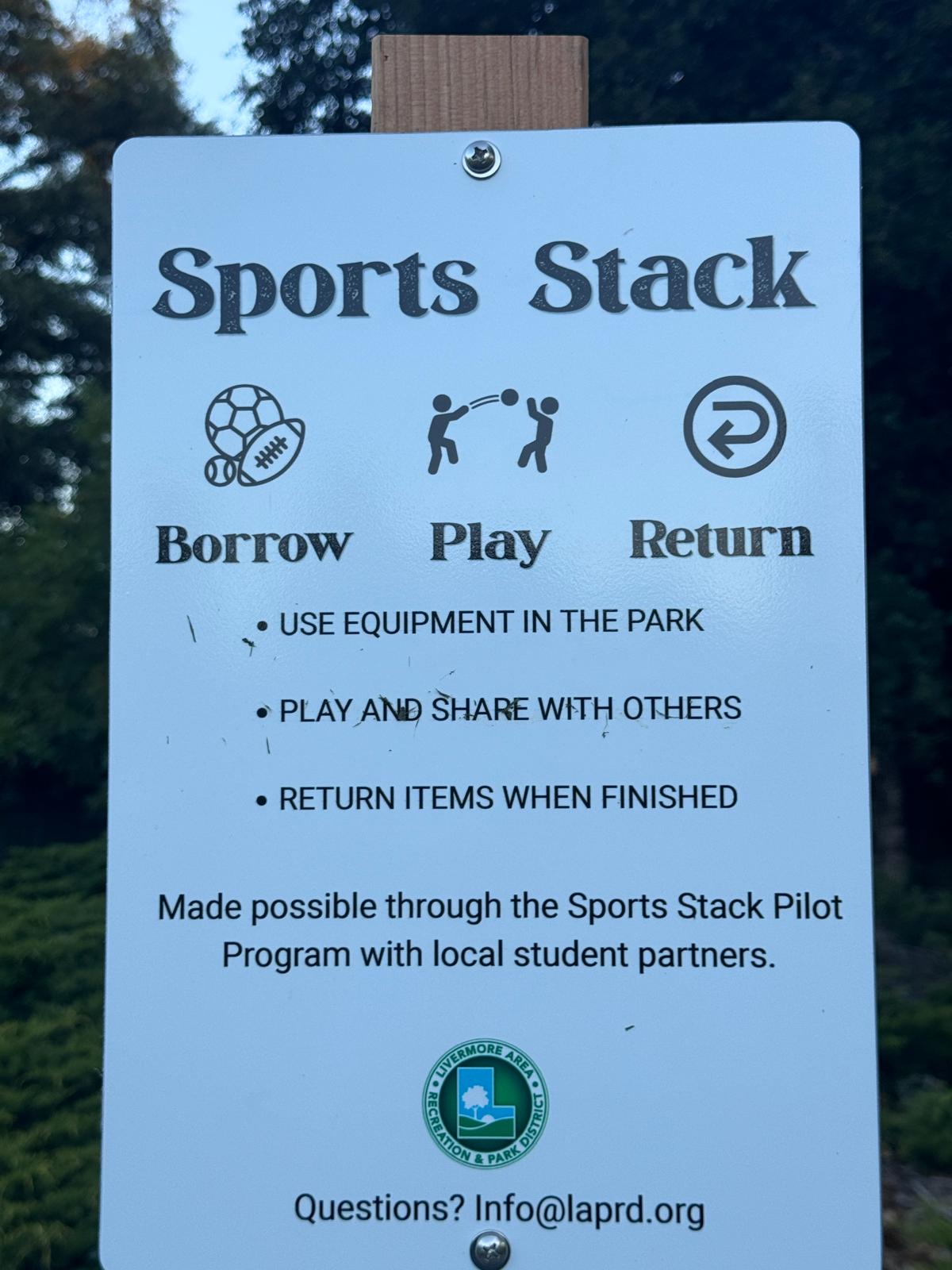 The Sports Stack sign: Borrow, Play, Return, with the Livermore Area Recreation and Park District logo