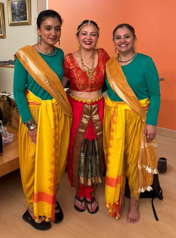 Neti, the actress playing Vasantsena, and Neti's mom in costume before the show